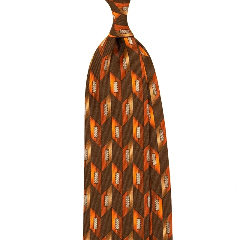 Printed double side silk tie in brown rust colour. Customized tie from Stefano Cau, handmade in Italy.