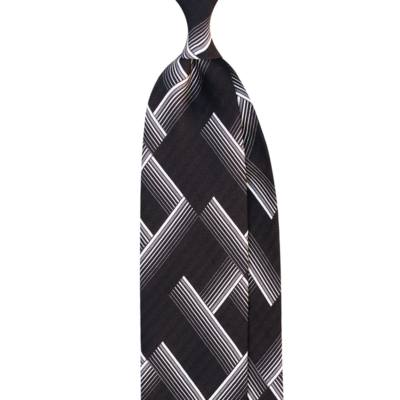 Printed silk jacquard tie in black color. Geometric motif inspired by american 90's. Made in Italy by Stefano Cau